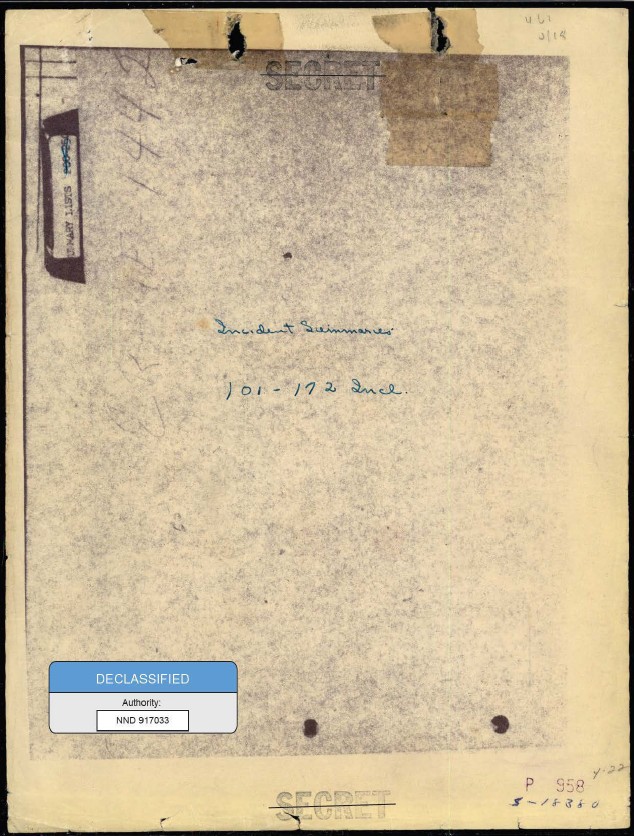 A file cover with notes and a declassification sticker.