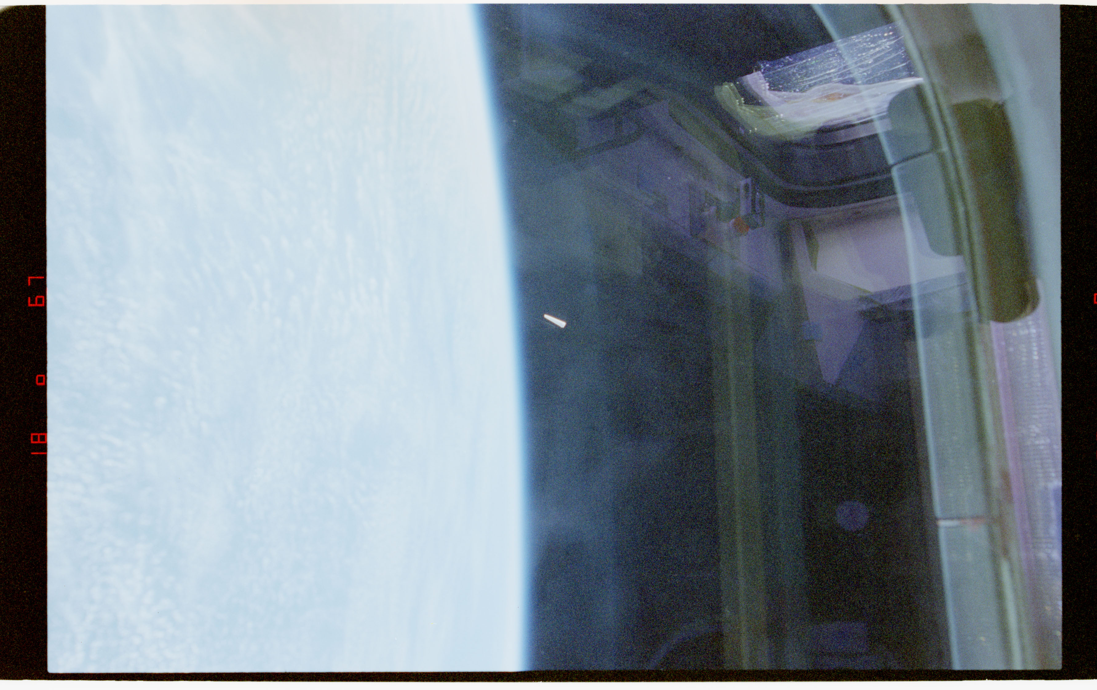 A photograph of an unidentified object in low-Earth orbit, taken from Space Shuttle Columbia in 1996.