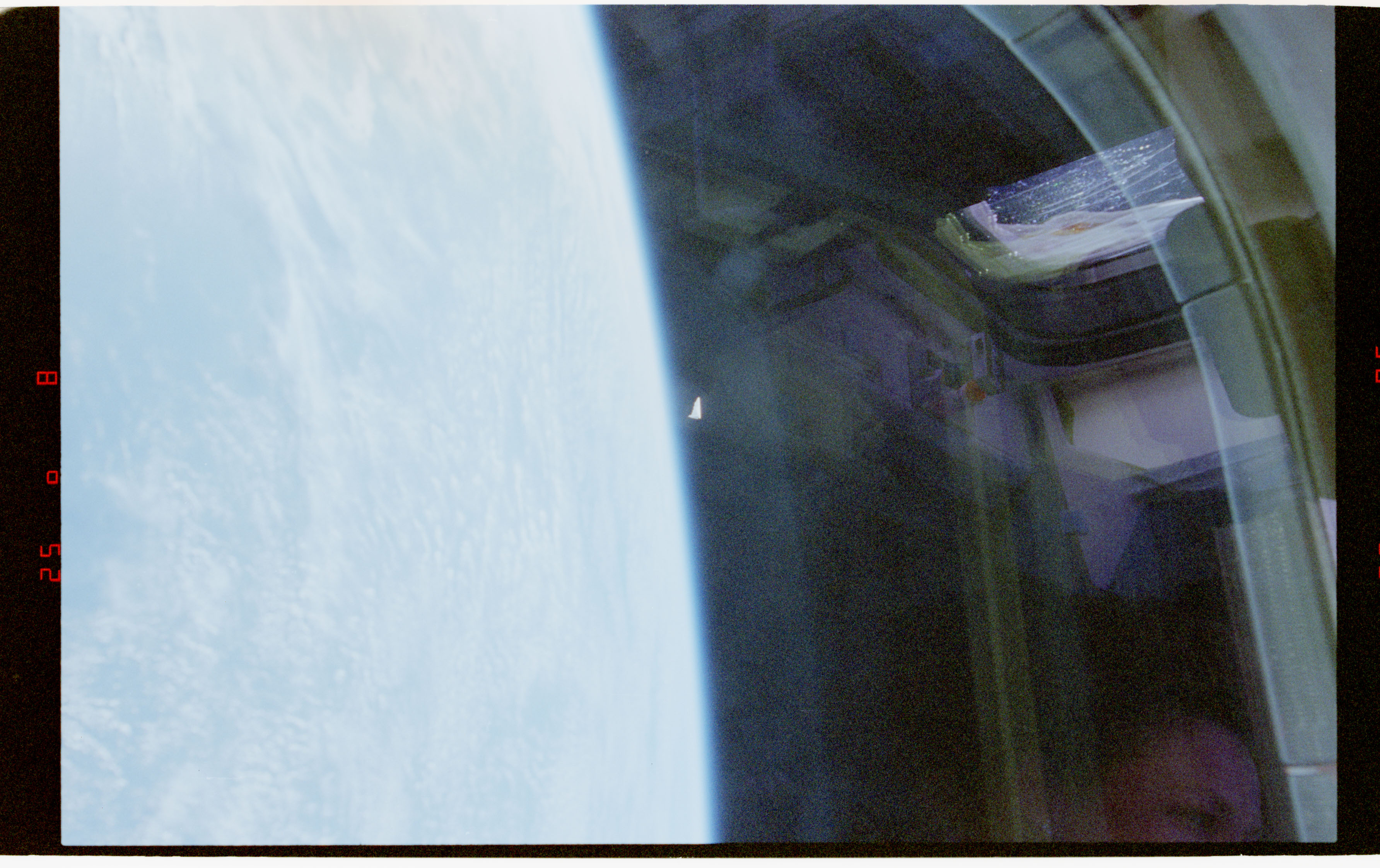 A photograph of an unidentified object in low-Earth orbit, taken from Space Shuttle Columbia in 1996.