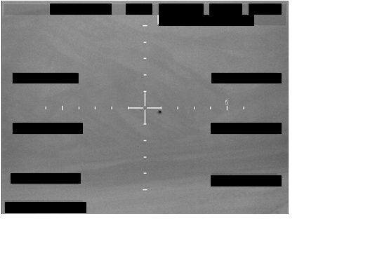 Redacted sensor image with a crosshair targeting reticle.