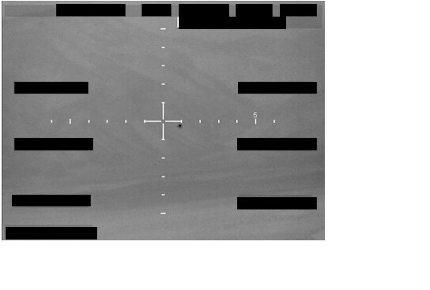 Redacted sensor image with a crosshair targeting reticle.